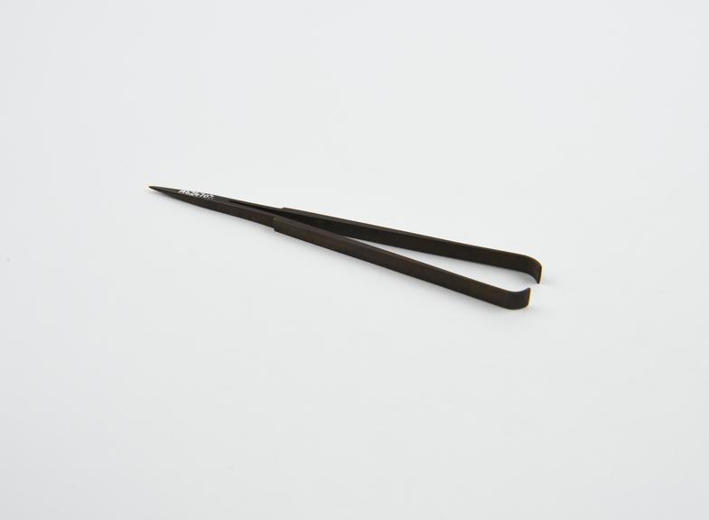 Combined forceps and probe, brass copy of Roman original