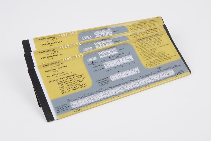 3 radiation slide rules by the Light Military Electronics Dept