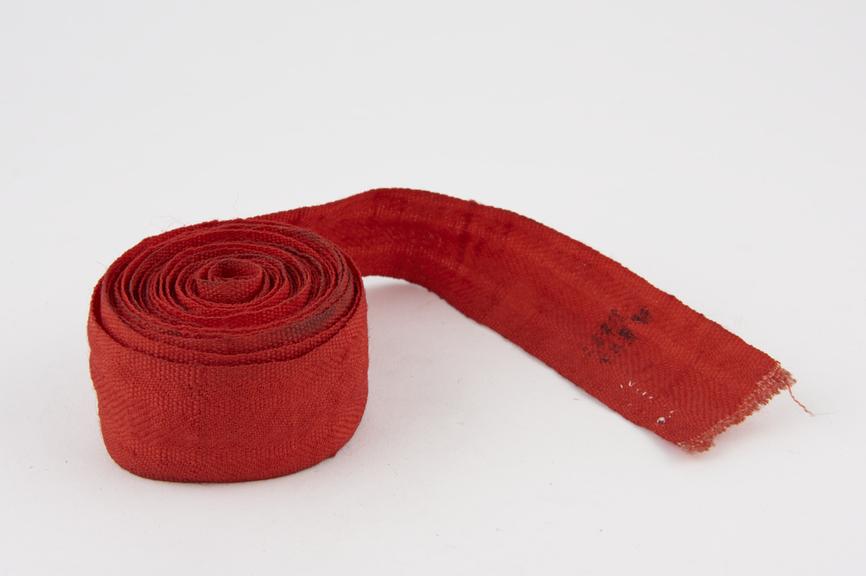 Length of red bandage which was exhibited in the Wellcome