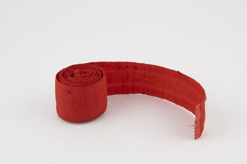 Length of red bandage which was exhibited in the Wellcome