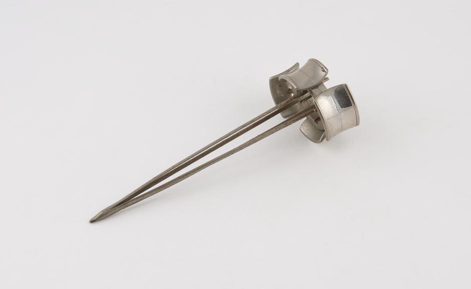 Part of a urethral(?) dilator, nickel plated metal, by Gentile