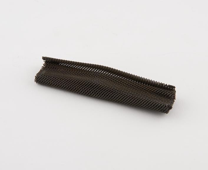 Piece of woven coiled wire as used in the tyre made by