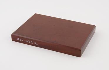 Display base for motor car magneto