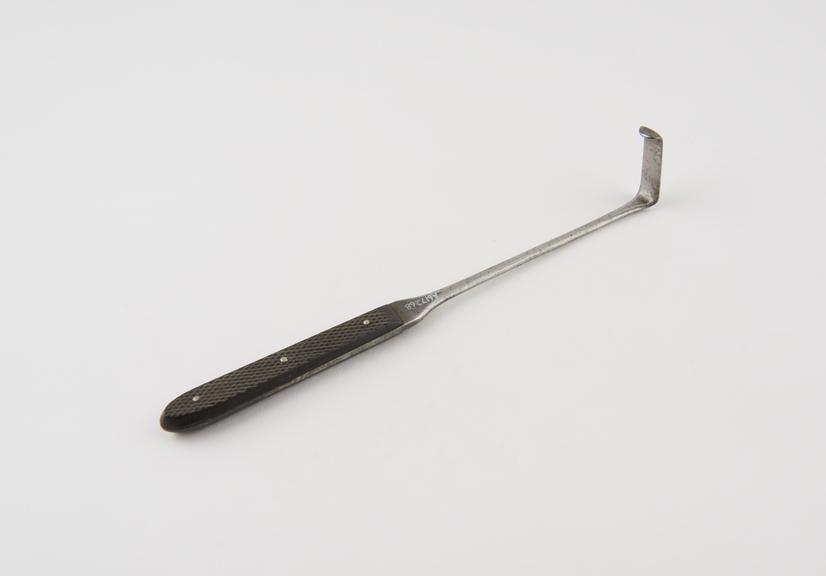 Retractor, single hook, steel and ebony, by Hawksley of London