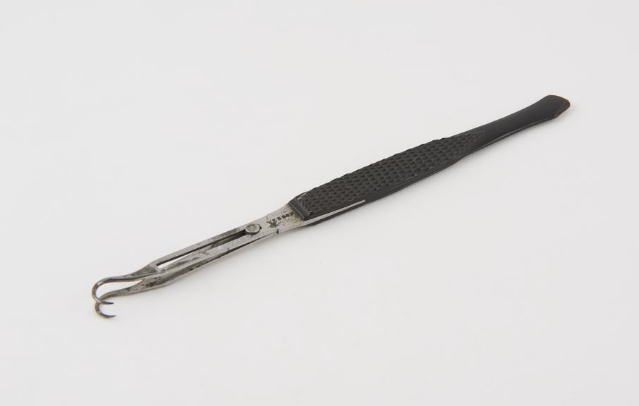 Double sliding hook, steel and ebony, by Weedon of London