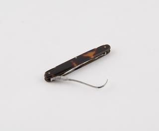 Combined aneurism and exploring needles steel and tortoiseshell