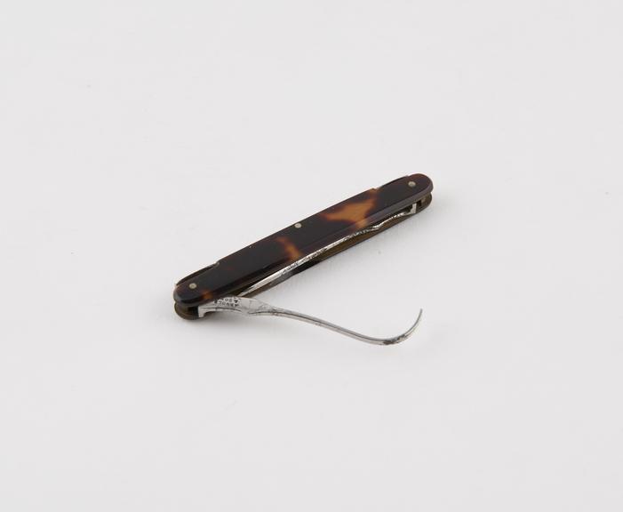 Combined aneurism and exploring needles steel and tortoiseshell