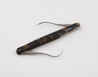 Tenaculum and aneurism needle