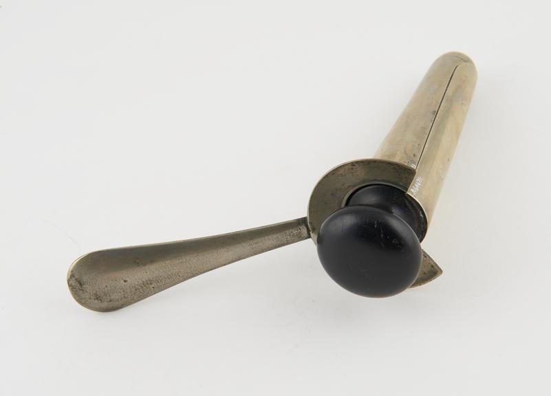 Rectal speculum, Curling, metal, nickel plated, with ebony plug