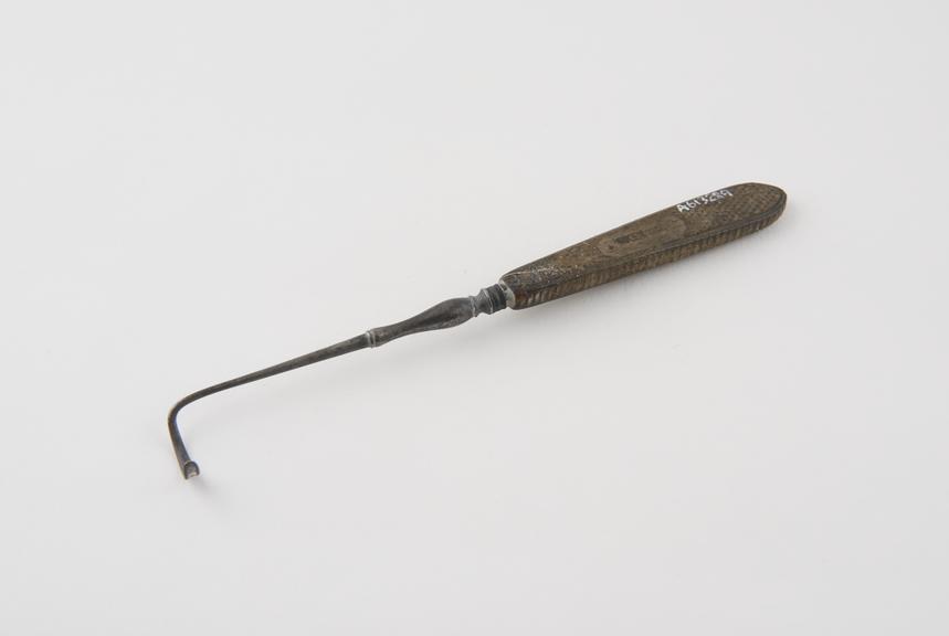 Suture needle, steel and ebony, by Weiss of London