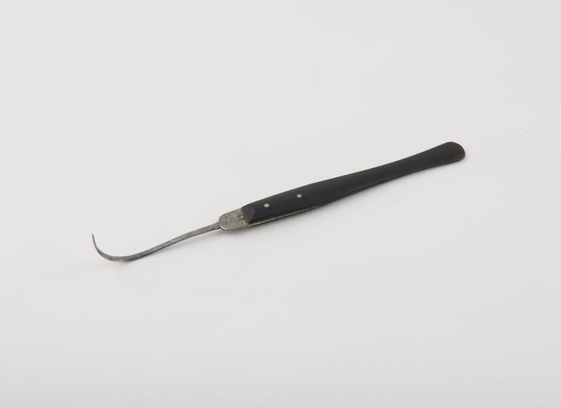 Suture needle, steel and ebony, by W. B