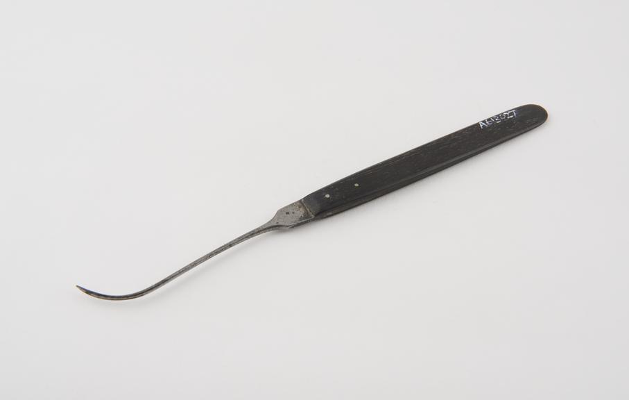 Pedicle needle, steel and ebony, by Arnold and Sons of London