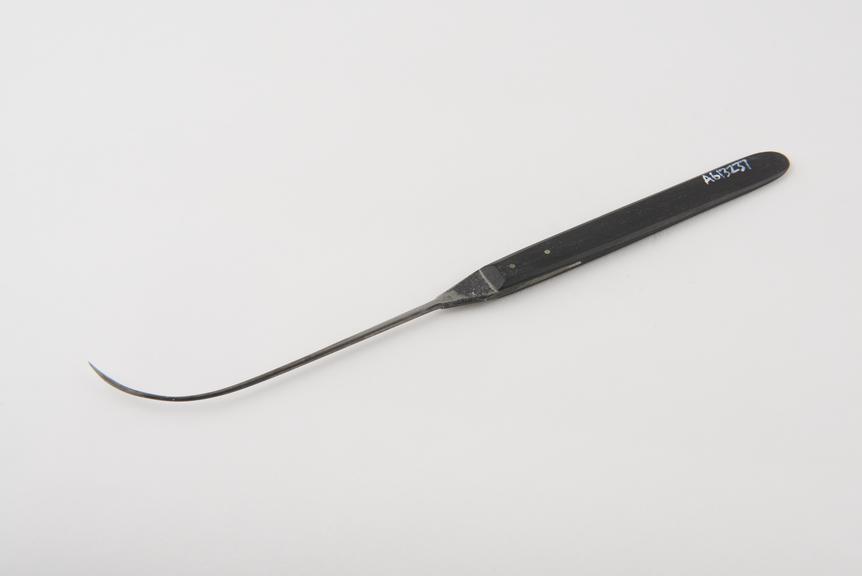Suture needle, steel and ebony, maker's name illegible