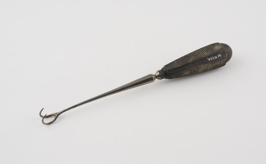 Hook, double, steel and ebony, by Savigny and Co