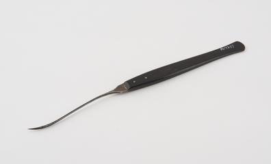 Suture needle, steel and vulcanite, 19th century