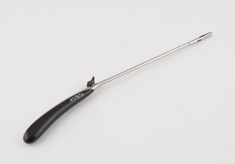 Extractor, urethral, steel and ebony, by Collin of Paris