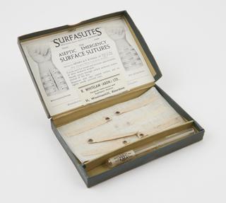 Ampoule of sterile suture with suture needle by Davis and Geck