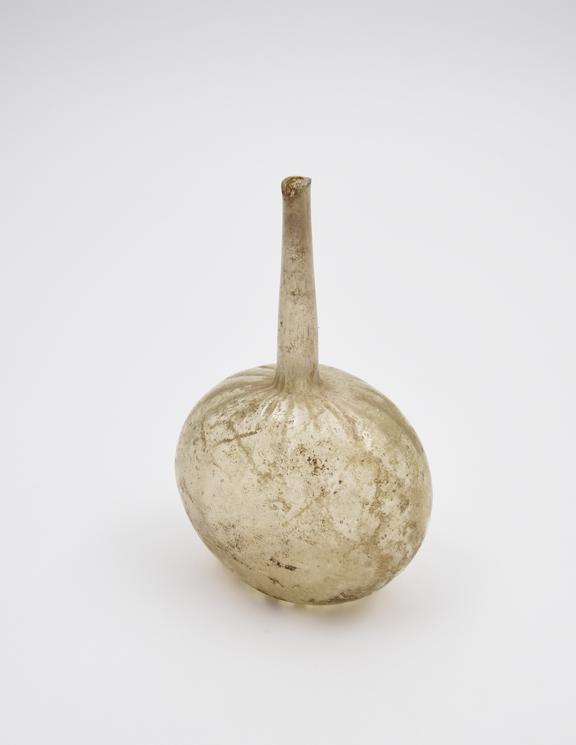 Glass omom, green, squat bulbous body, concave base