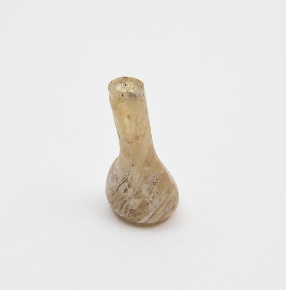 Glass flask, pale yellow, conical body, kicked base