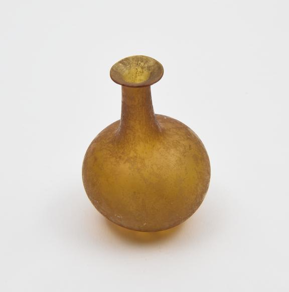 Glass flask, yellow, bulbous body smoothed on a lathe