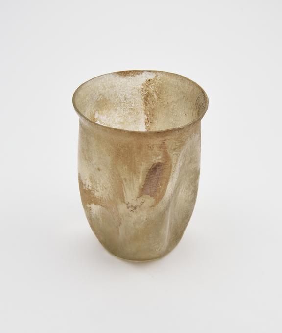 Glass cup, with indented sides, Roman, 151-300AD