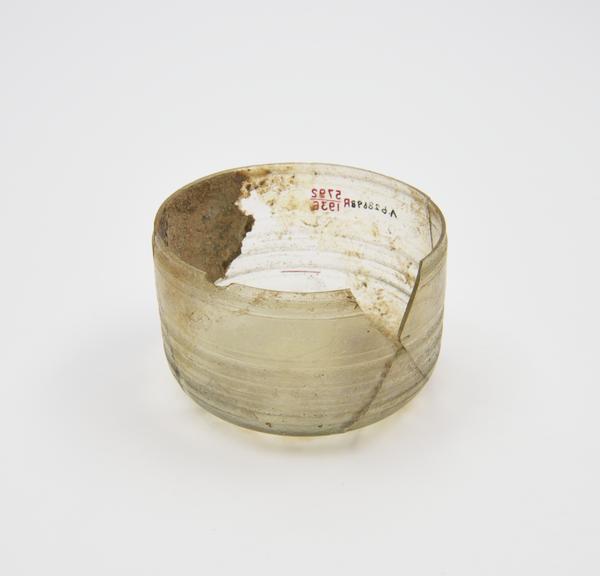 Glass bowl, pale yellow, straight sides, plain rim