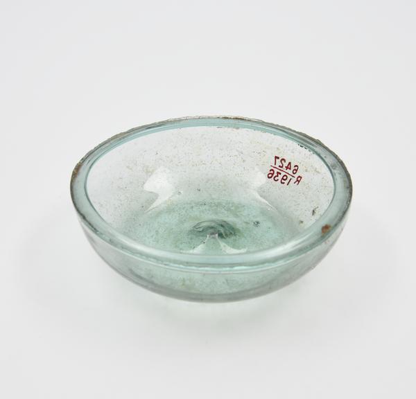 Glass bowl, made from the broken base of flask, Roman, 151-300AD