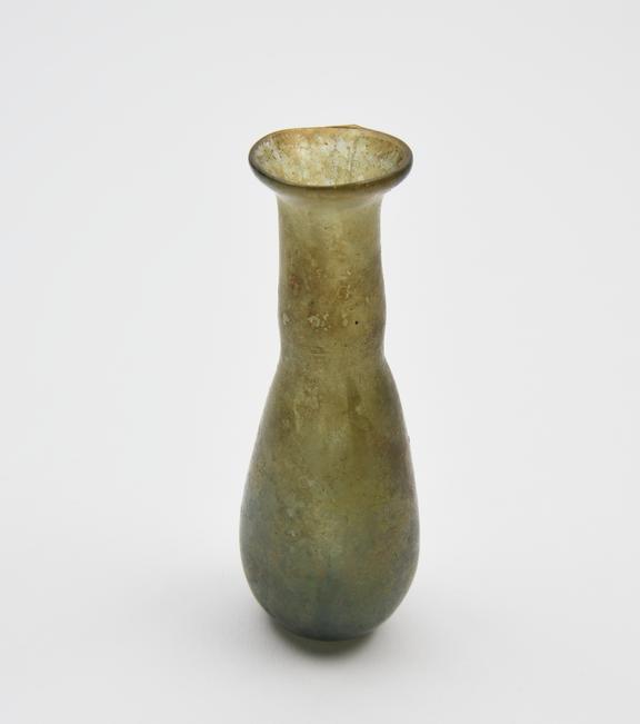 Glass unguent bottle, green, early Roman, 1 to 150 AD