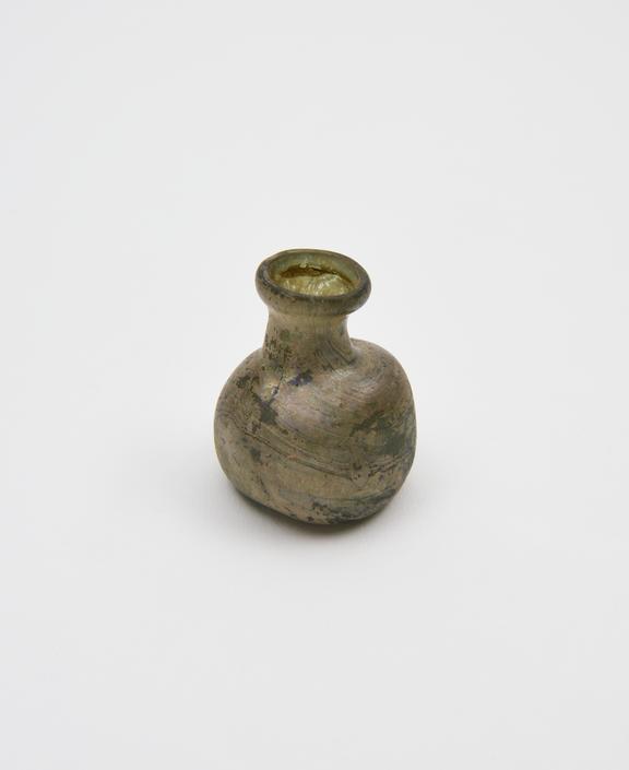 Glass bottle, green, kicked base, body rougly square