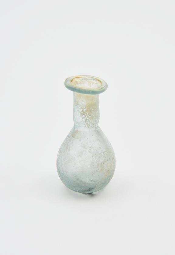 Glass unguent bottle, Roman, 151 to 300 AD