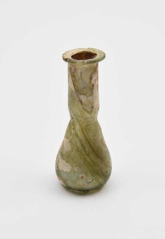 Glass unguent bottle, Roman, 151-300 AD.