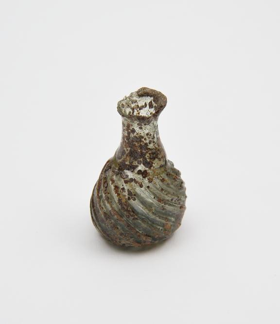 Glass flask, pale green, ovoid body, kicked base