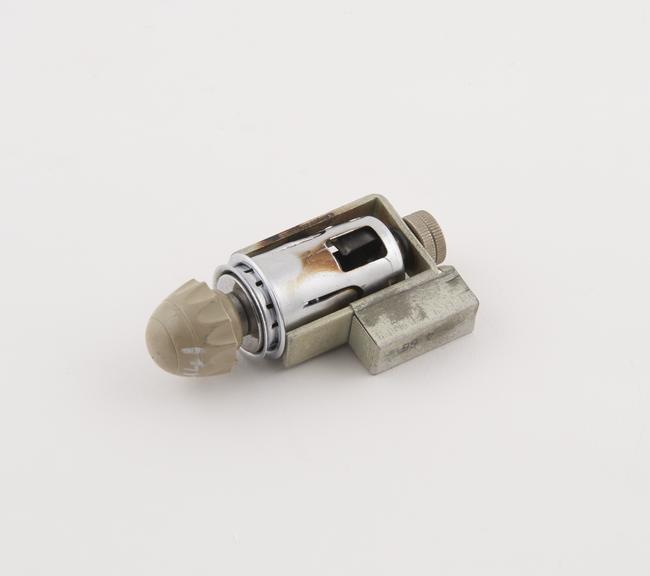 Cigarette lighter, marked 'Trico 455', c.1960.