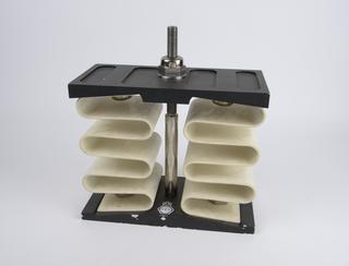 Sulcated spring in fibre reinforced polyester