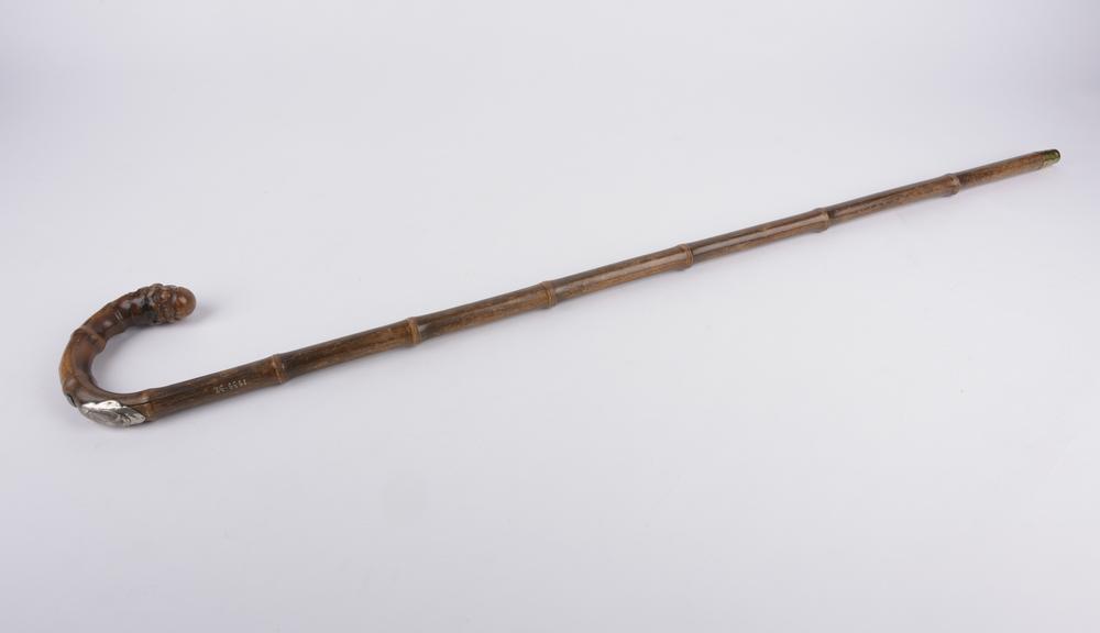 Horse measuring walking stick with inset sliding scale of