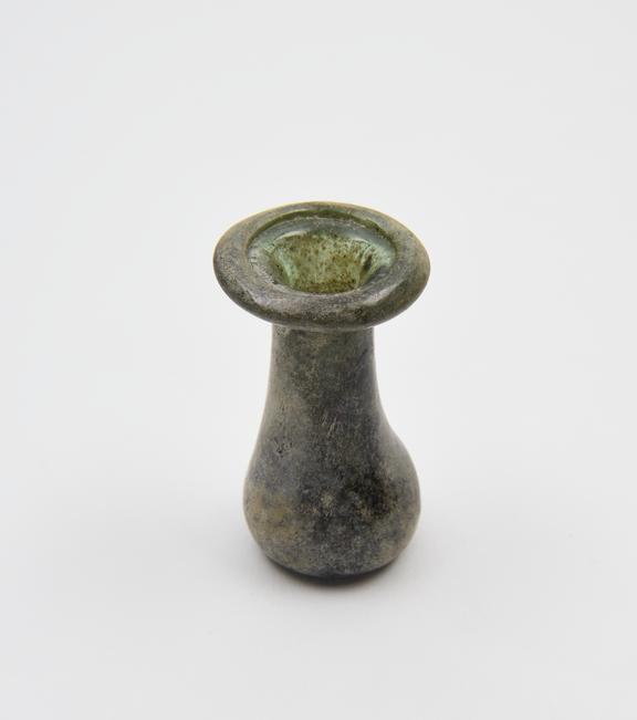 Glass unguent bottle, Roman, 151-300AD, possibly made in Egypt