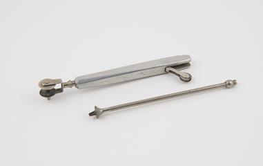 Suture needle(?), broken and incomplete, steel