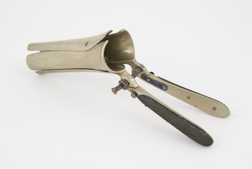 Vaginal speculum, Ricord, four bladed, folding handles, metal