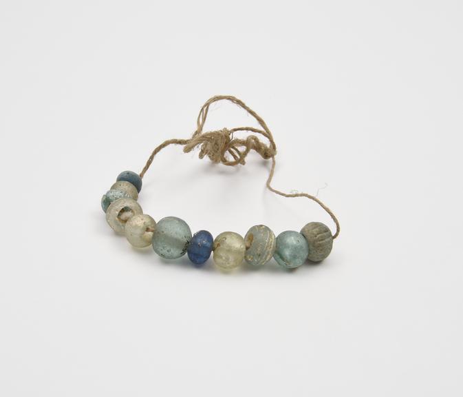 11 glass beads, Roman