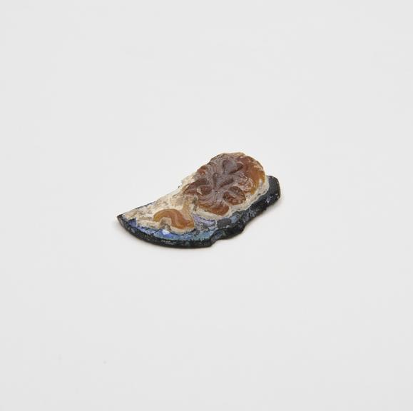 Glass cameo fragment, possibly from medallion