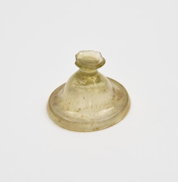 Glass base only, possibly from a goblet, green, possibly Roman