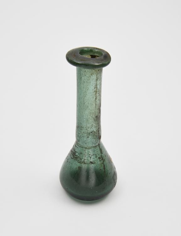 Glass unguent bottle, Roman, 151 to 300 AD