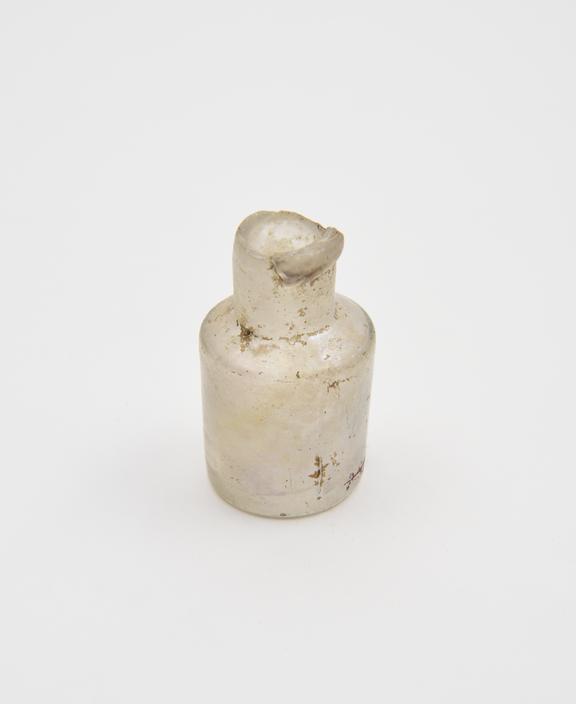 Glass bottle, colourless, mould-blown, cylindrical body