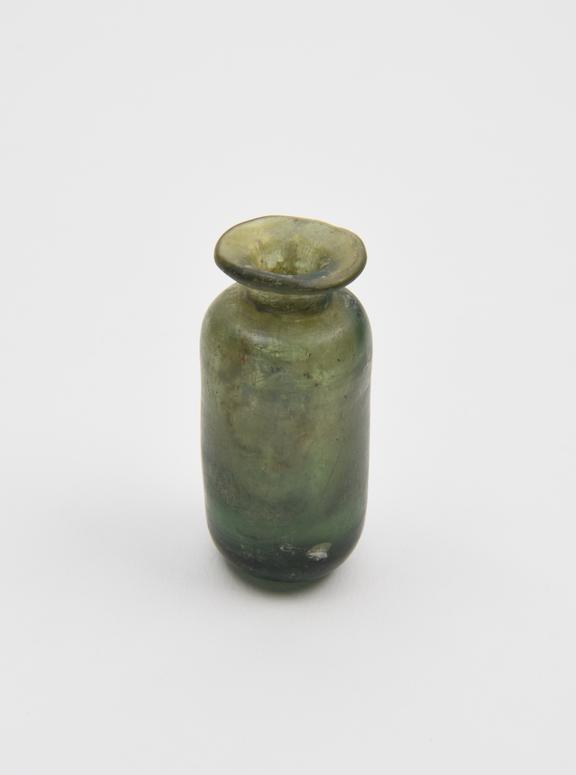 Glass bottle, dark green, cylindrical body, kicked base