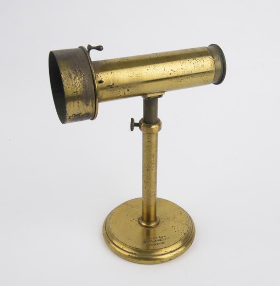 Adjustable aperture on brass stand