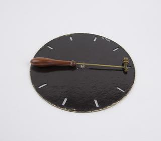 Phenakistiscope toy wheel with handle from 'Living pictures optical illusion' set