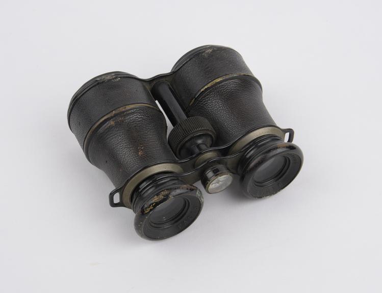 Non-prismatic binoculars with compass