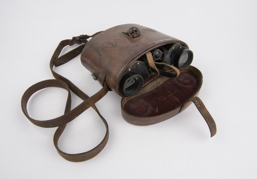 Pair of Ross binoculars used in world war 1; with a leather case