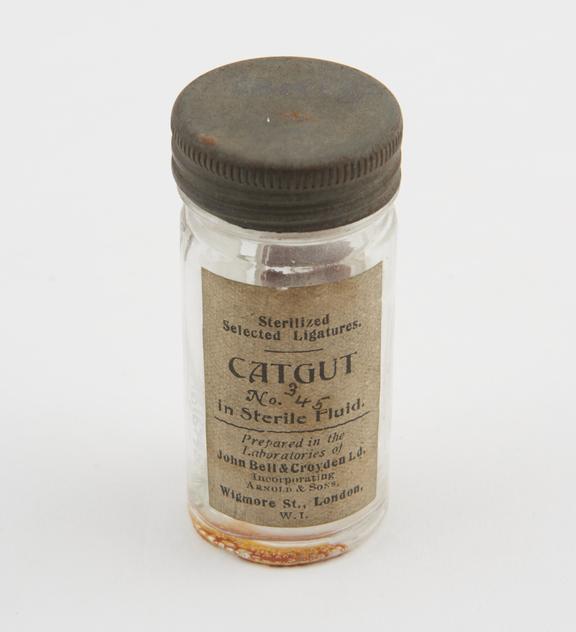 Jar of sterile catgut suture, by John Bell and Croyden Ltd