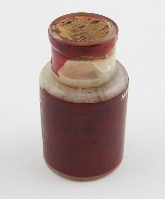 Bottle of sterile ligatures, supplied by Pettie and Whitelaw